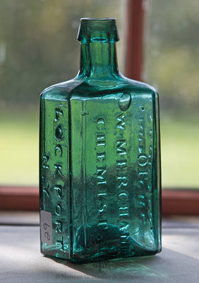 "From The / Laboratory / Of / G.W. Merchant / Chemist. / Lockport / N.Y." Medicine Bottle, AAM pg. 350