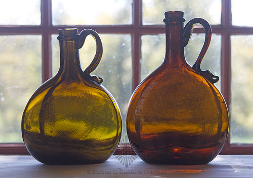 Two Freeblown Handled Whiskey Bottles, Similar in form and construction to MW plate 48, top right