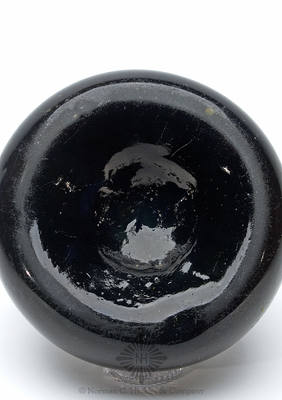 Black Glass Onion Wine Bottle, Similar in form and construction to AG pg. 73, right