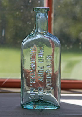 "Kitchel's / Wind Puff Cure / Coldwater, Mich." Veterinary Medicine Bottle, AAM pg. 296