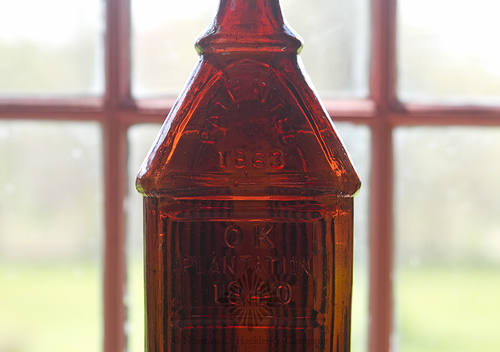 "OK / Plantation / 1840 / Patented / 1863" Figural Bitters Type Bottle, R/H pg. 408